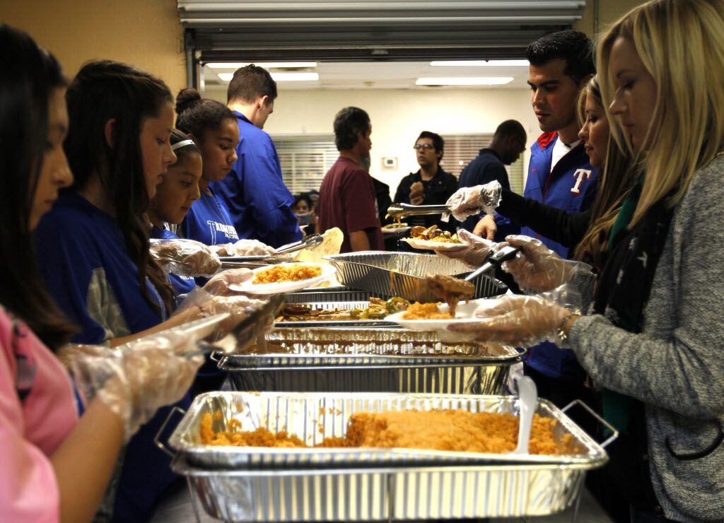 Arlington Life Shelter, shown during a Thanksgiving dinner, received $30,000 in the first round of grants distributed by The Dallas Morning News Charities.