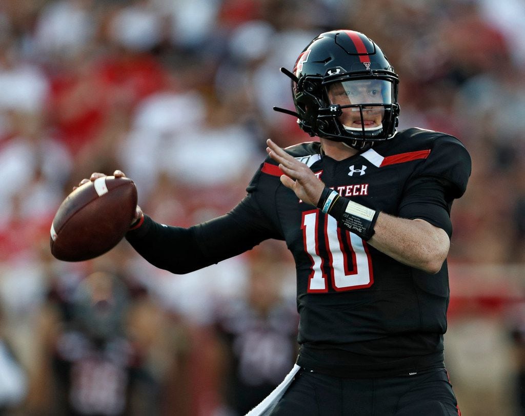 Texas Tech's Alan Bowman looks for a receiver during the first half of the team's NCAA...