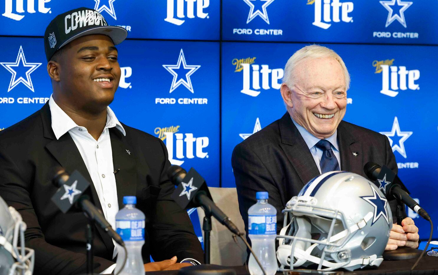 Dallas Cowboys first round draft pick Tyler Smith of Tulsa, left, and Cowboys owner Jerry...