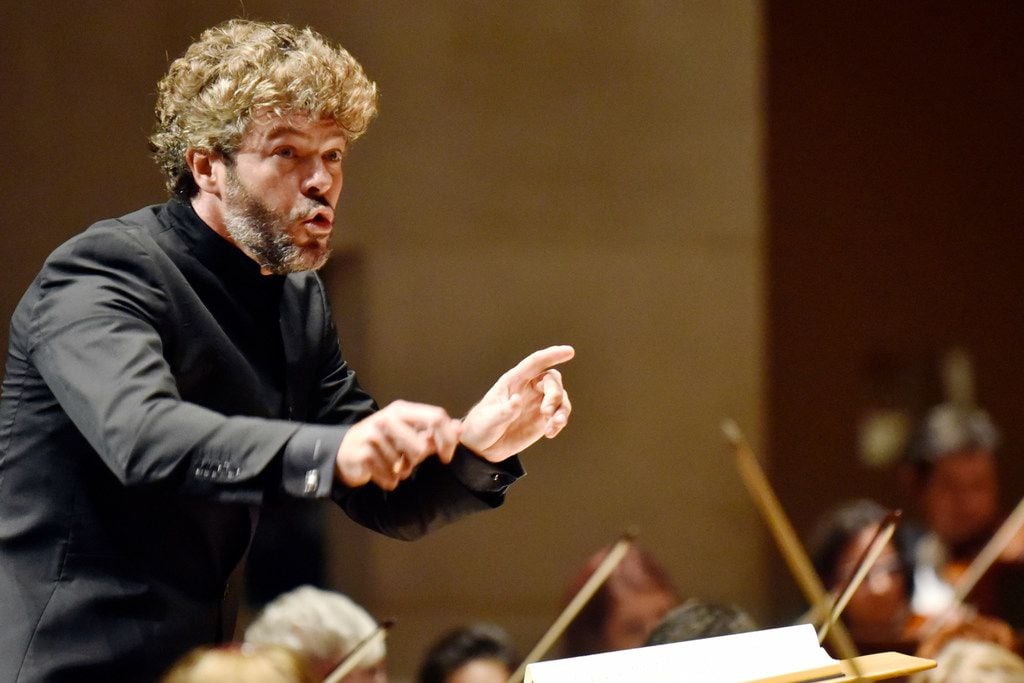 Guest conductor Pablo Heras-Casado conducts the Dallas Symphony Orchestra during a...