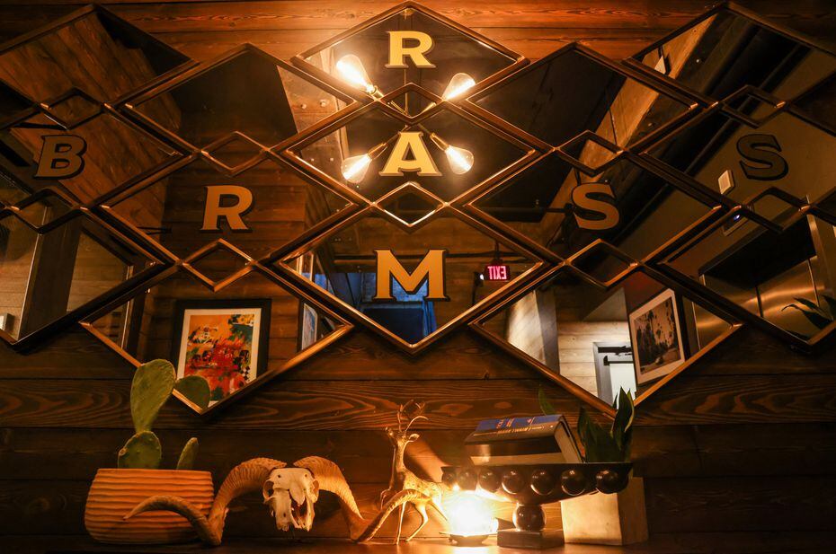 Mirrors lead the way to the entrance of prime rib restaurant Brass Ram on the second floor...