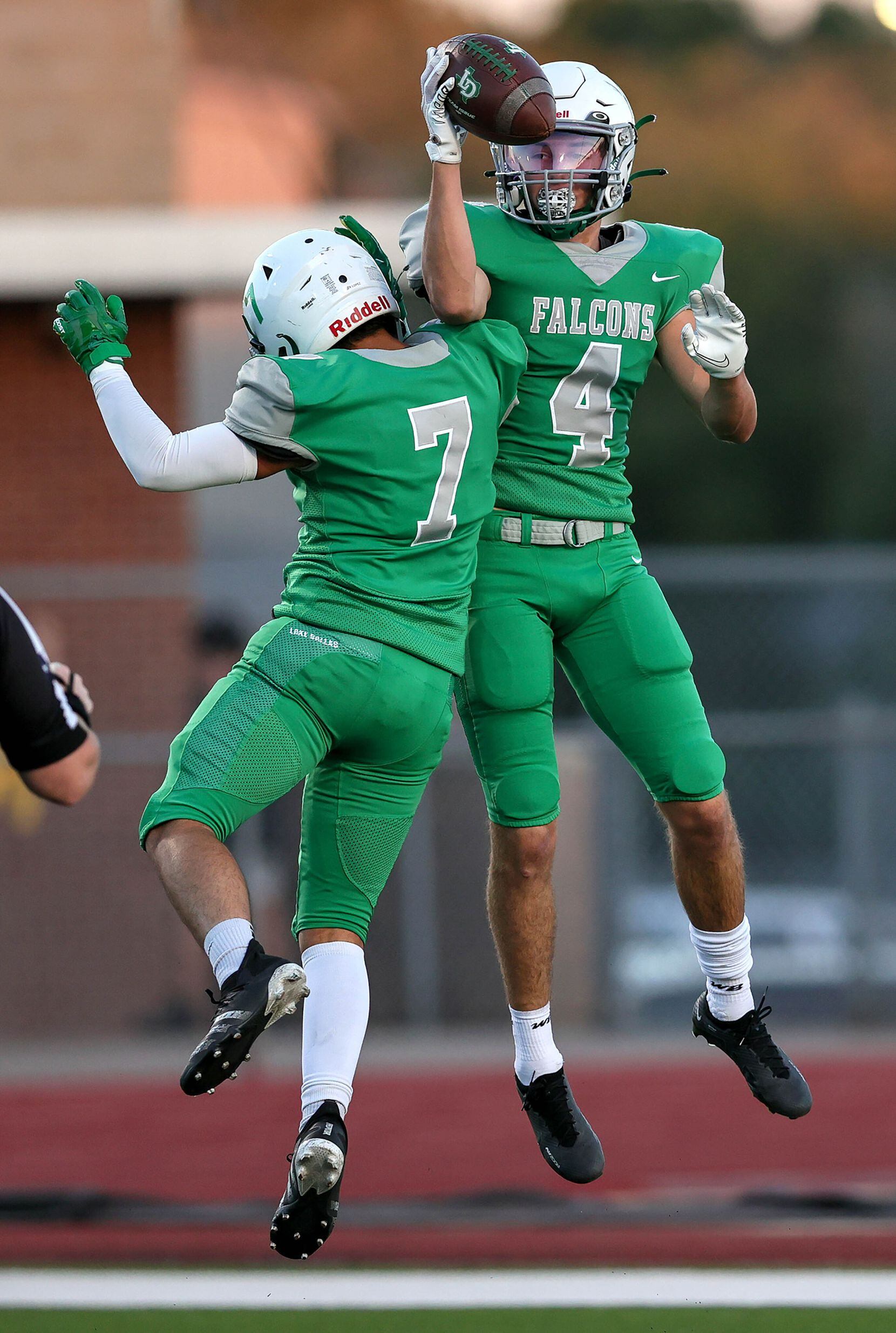 Lake Dallas running back Dylan Brauchle (4) celebrates with wide receiver Xavier Lopez (7)...