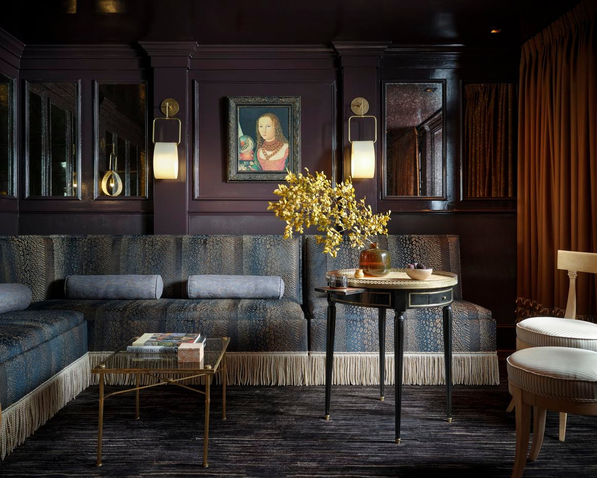 Take a look inside the basement wine cellar designer Liz MacPhail Interiors dreamed up for the 2021 Kips Bay Decorator Show House Dallas. The room has moody lighting, feminine details and an abundance of space for wine storage.