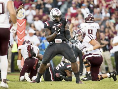 South Carolina defensive lineman Javon Kinlaw (3) celebrates a play during the second half of an NCAA college football game against Texas A&M Saturday, Oct. 13, 2018, in Columbia, S.C. Texas A&M defeated South Carolina 26-23.