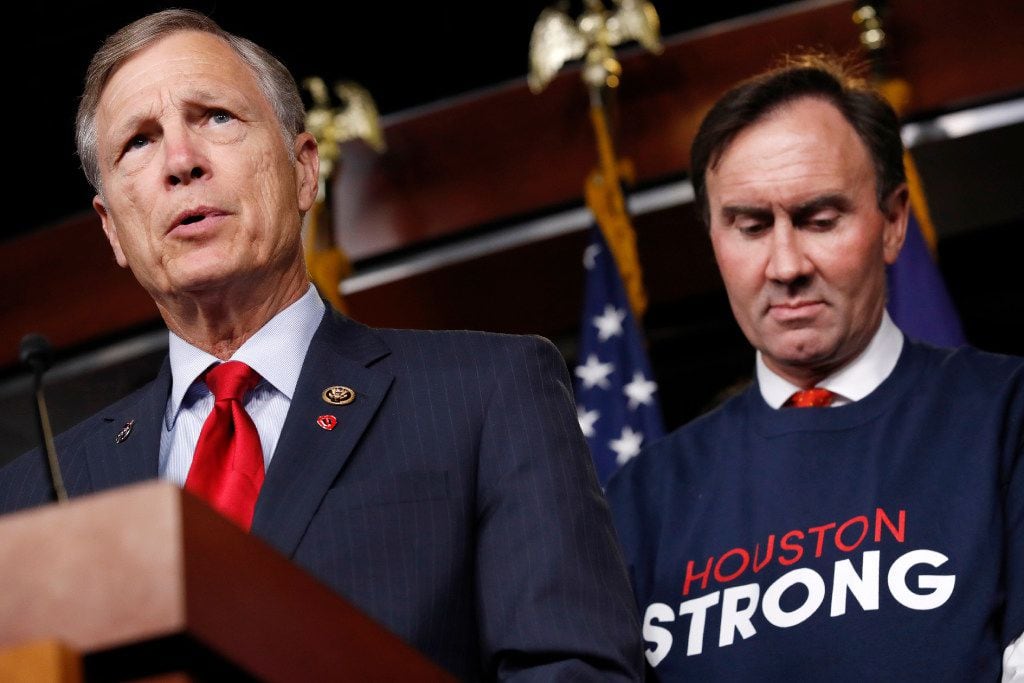 Rep. Brian Babin (left), R-Woodville, spoke about an emergency funding bill for Harvey relief efforts in early September. At right is Rep. Pete Olson, R-Sugar Land. (Jacquelyn Martin/The Associated Press)