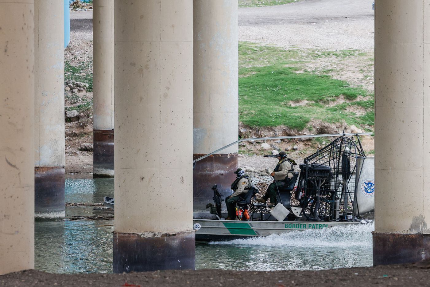 Border Patrol officers on an airboat, patrol the Rio Grande in Eagle Pass on Thursday, June...