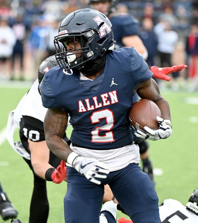 Allen's Jaylen Jenkins (2) looks for running room in the first half of Class 6A Division I Region I semifinal playoff game between Allen and Euless Trinity, Saturday, Nov. 27, 2021, in Allen, Texas. (Matt Strasen/Special Contributor)