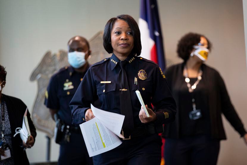 Chief of Police Reneé Hall walks up to the podium before speaking about last night's arrests...