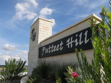 The entrance to new housing development Putteet Hill stands off Highway 377 in Cresson.