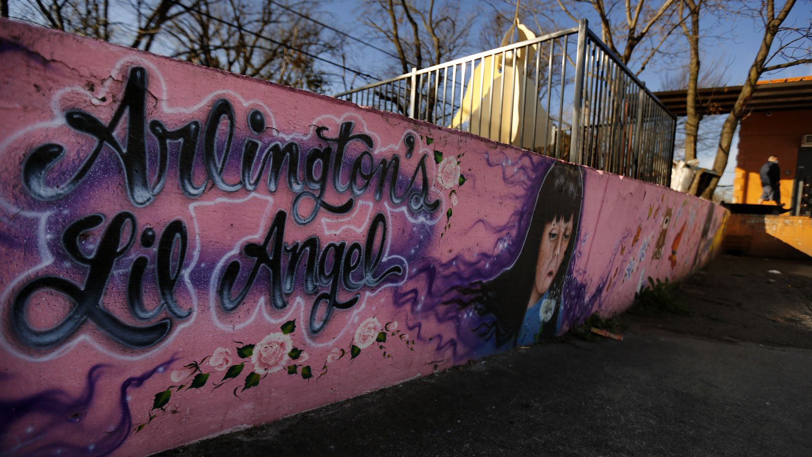 A large painted mural adorns a memorial for Amber Hagerman, the little girl who was abducted on her bike and later found dead in Arlington, Texas in 1996.