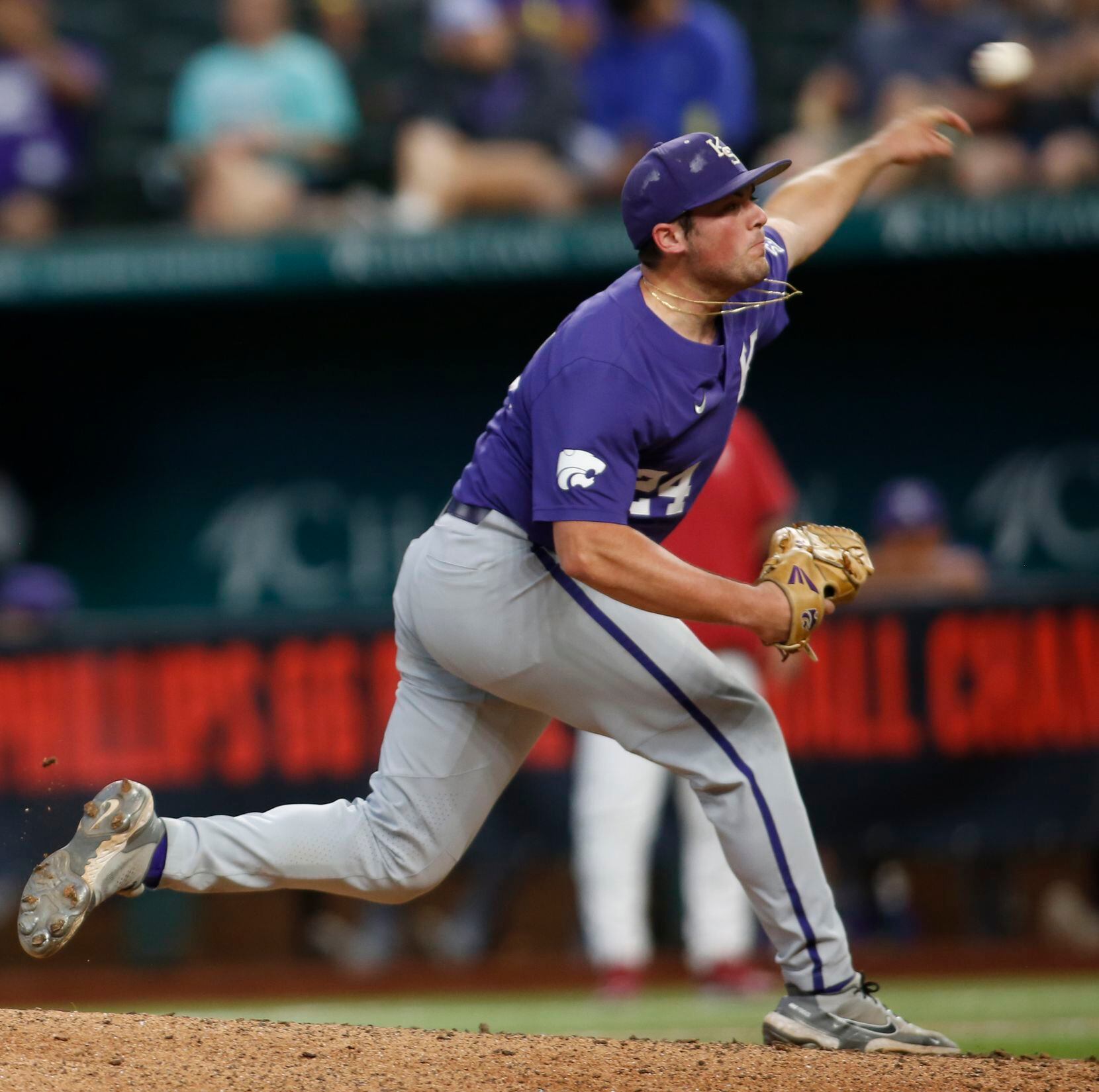 Kansas State pitcher Dylan Phillips (24) delivers a pitch to a Oklahoma batter during the...