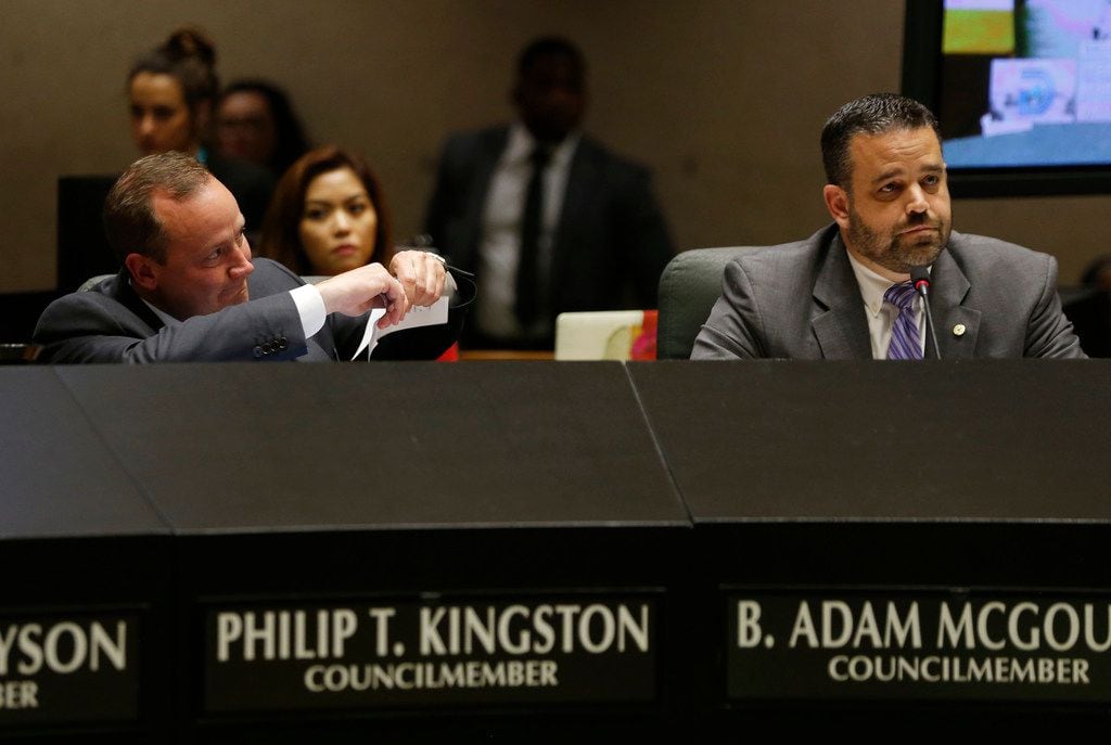 Dallas City council member Philip T. Kingston rips up a copy of an amendment proposed by...