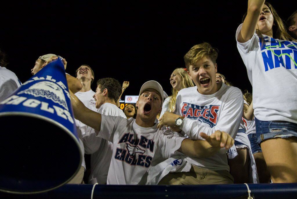 Allen fans in the student section cheer after Allen scored a touchdown during the third...