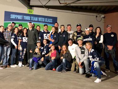 Friends of family of Leighton Vander Esch pose with the Cowboys rookie at CenturyLink Field...