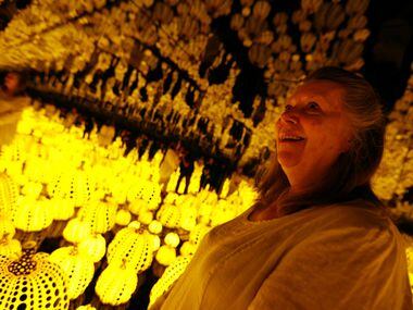 Connie Koval looks at the Kusama exhibit.