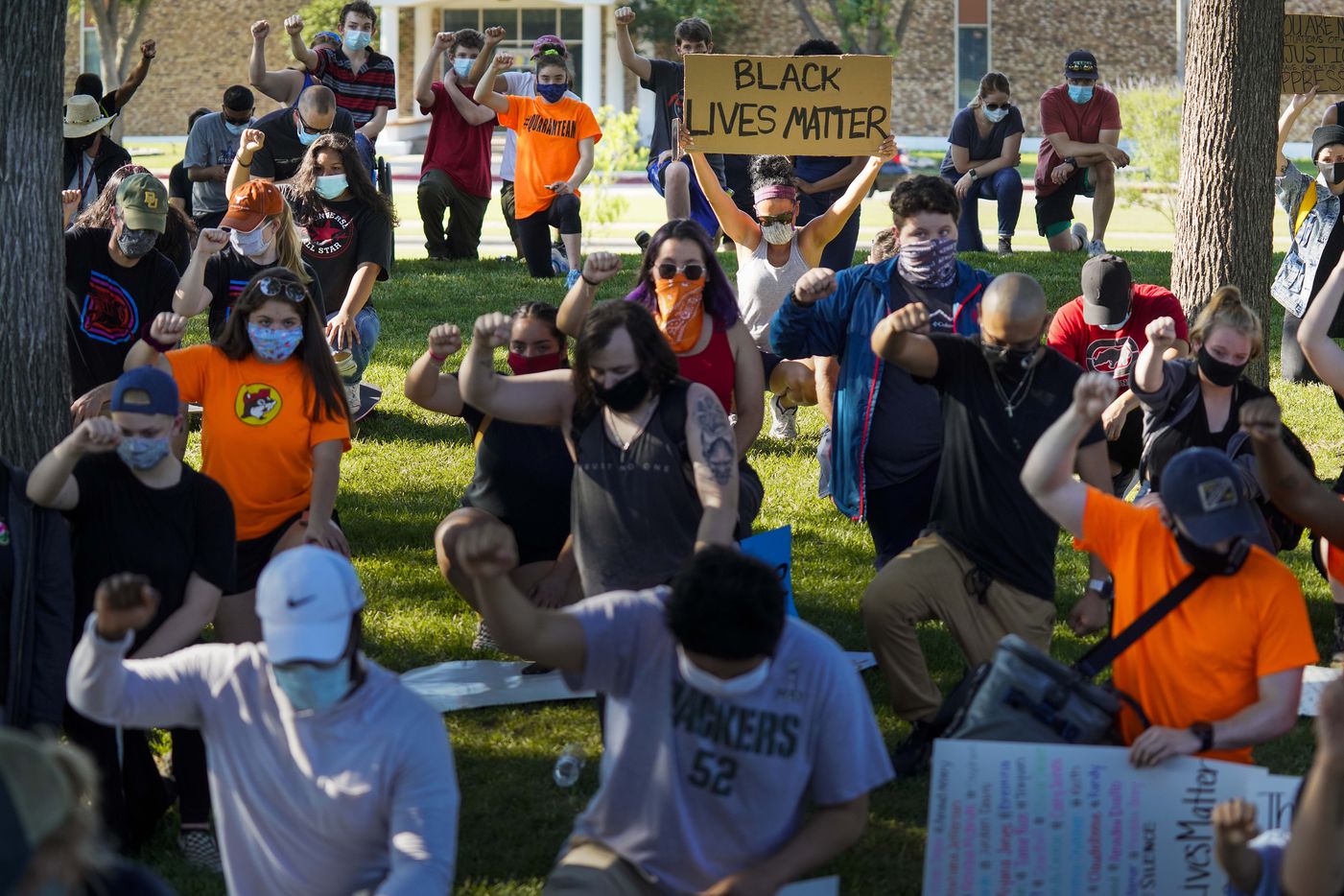Demonstrators take a knee for 8 minutes and 46 seconds during a protest organized by Berkner High School students at Berner Park as protests continue after the death of George Floyd on Wednesday, June 3, 2020, in Richardson. (Smiley N. Pool/The Dallas Morning News)