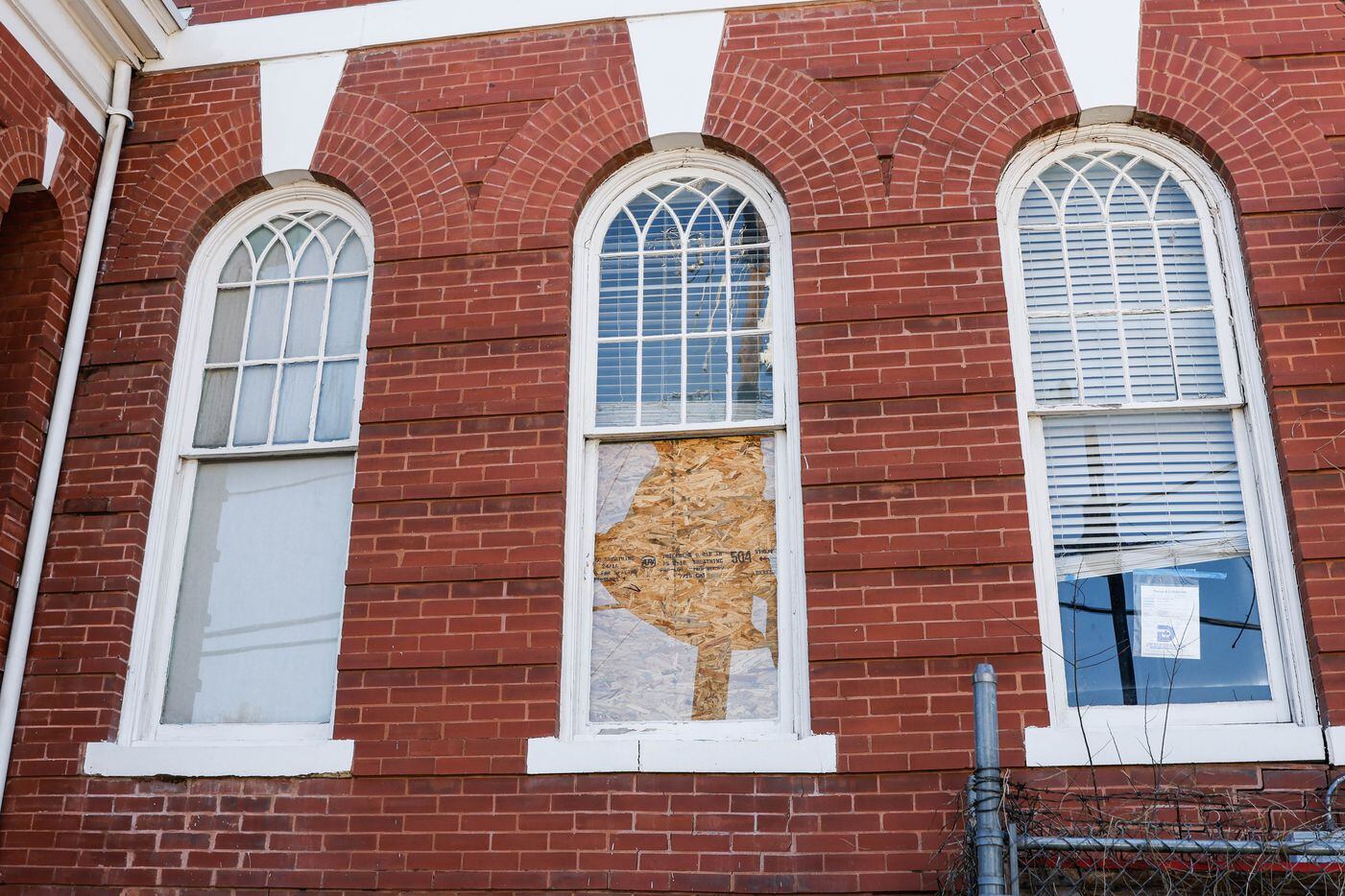 Another of the broken windows in the former Sisters of Divine Providence school.