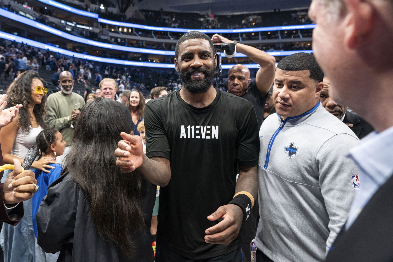 Dallas Mavericks' Kyrie Irving leaves the court after beating the Los Angeles Clippers...