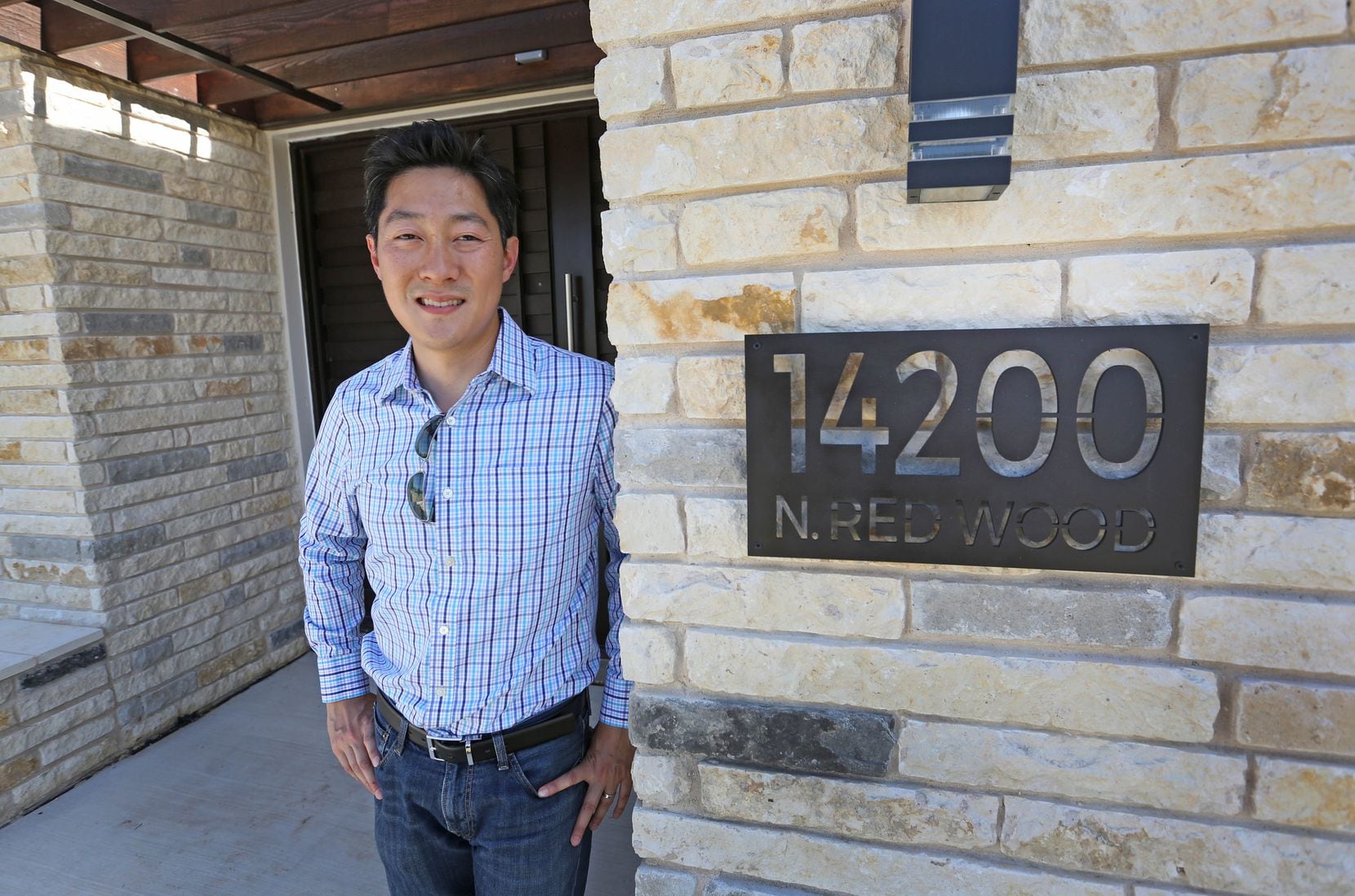 Builder Jimmy Tanghongs is pictured in the New Modern Home, a prototype house he has built,...