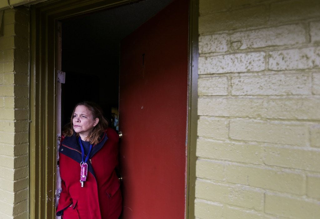 Marjorie McLin looks out the door of her home at Bryan Song Apartments, which she will have...