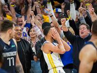 Golden State Warriors guard Stephen Curry (30) celebrates after hitting a 3-pointer in the...