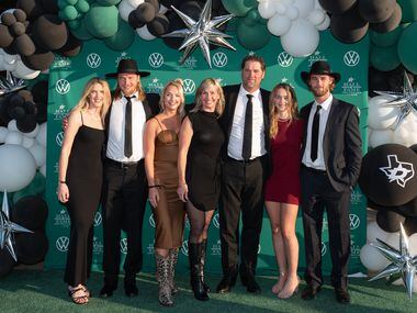 Former Dallas Stars player Derian Hatcher, third from right, and his wife Heather Hatcher,...