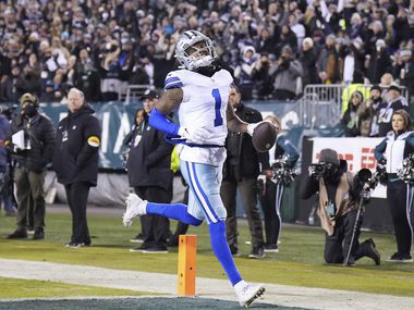 Dallas Cowboys wide receiver Ced Wilson (1) scores untouched on a 14-yard touchdown  reception during the first quarter of an NFL football game against the Philadelphia Eagles at Lincoln Financial Field on Saturday, Jan. 8, 2022.