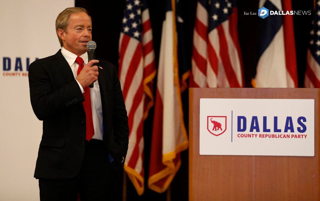 Phillip Huffines, chairman of the Dallas County Republican Party, makes an announcement...