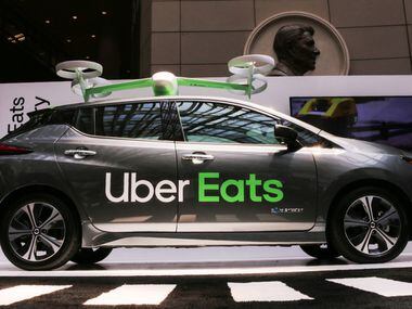 An Uber Eats car and drone was on display at the Uber Elevate Summit, too. Uber is testing...