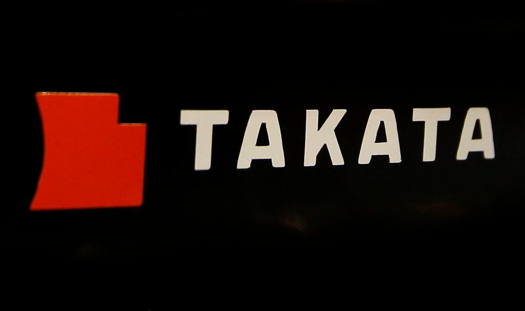 In this July 6, 2016 photo, the logo of Takata Corp. is seen at an auto-supply shop in...