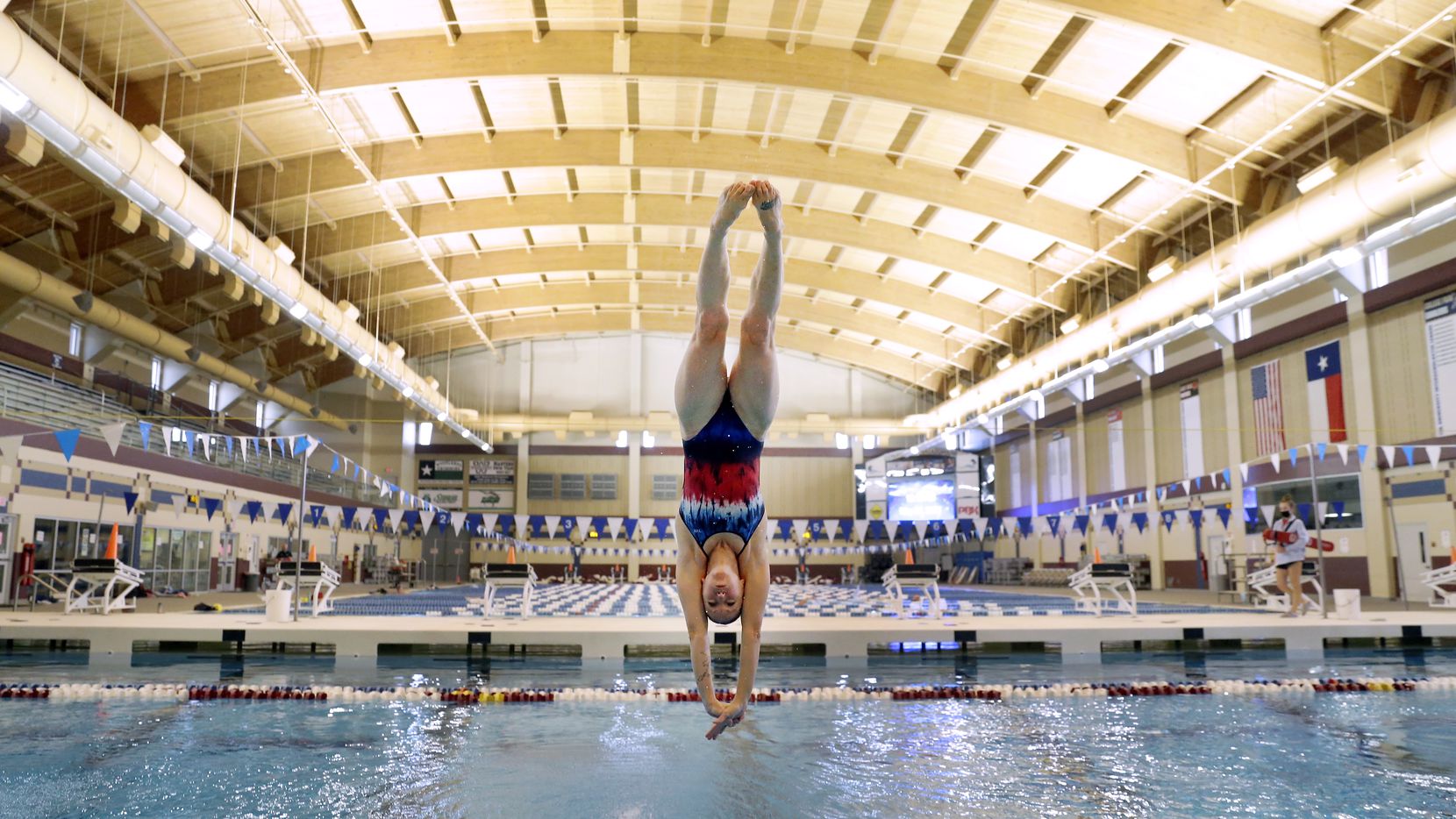 Laura Wilkinson, who won an Olympic gold medal in 2000, practices a series of dives at the...