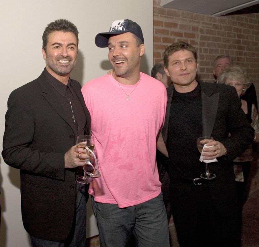 George Michael (left), David LaChapelle (center) and Kenny Goss at the Goss Gallery opening...