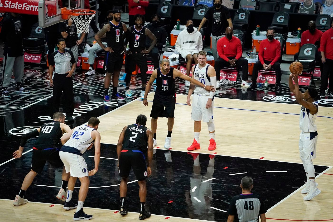 Dallas Mavericks guard Josh Richardson (0) shoots a free throw during the second half of an NBA playoff basketball game against the LA Clippers at Staples Center on Wednesday, May 26, 2021, in Los Angeles. The Mavericks won the game 127-121.