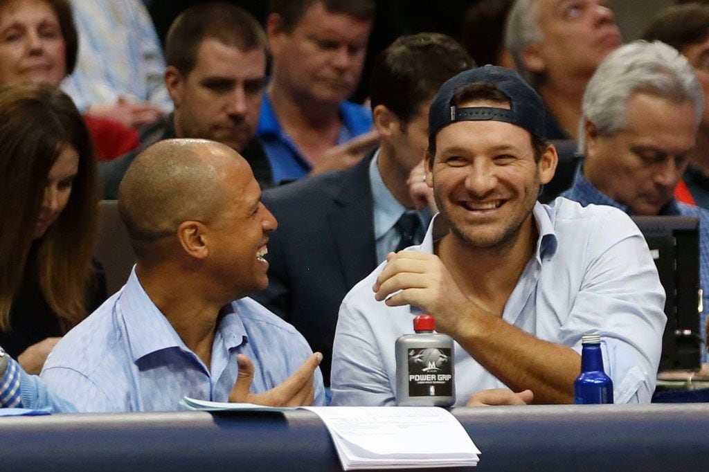 Former Dallas Cowboys players Miles Austin and Tony Romo laughing during the second half of...