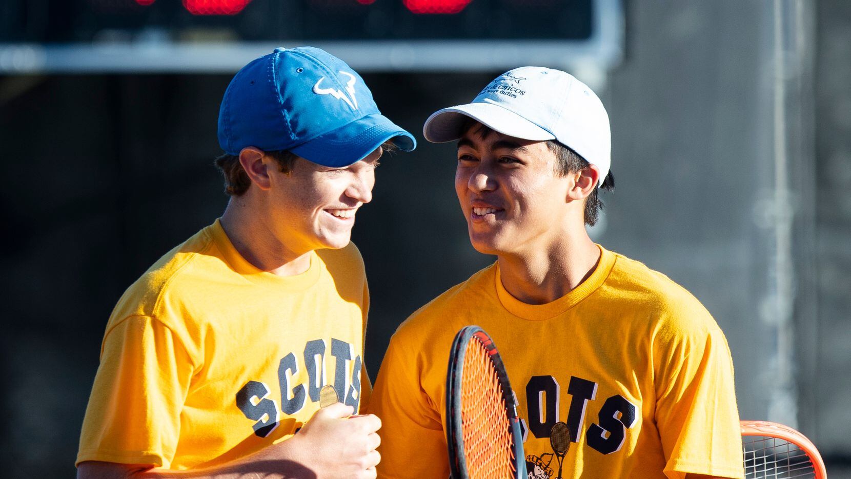 Highland Park’s Carl Newell, left, and William Covin celebrate during a double match against...