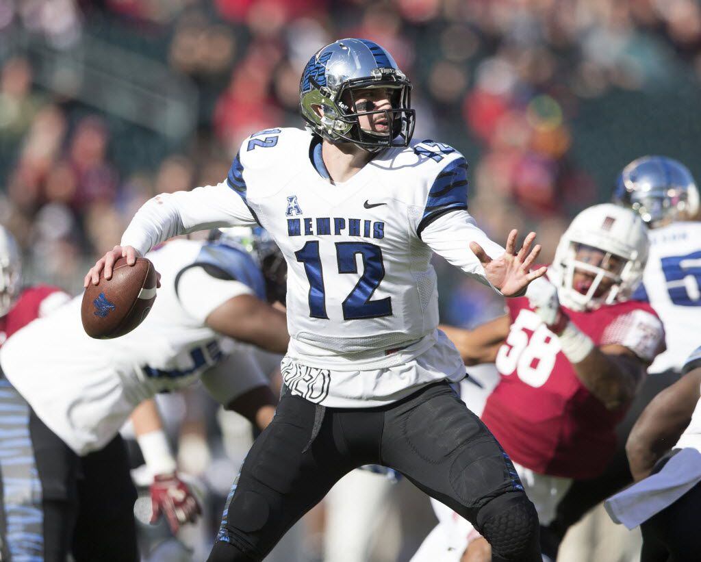 PHILADELPHIA, PA - NOVEMBER 21: Paxton Lynch #12 of the Memphis Tigers throws a pass in the...