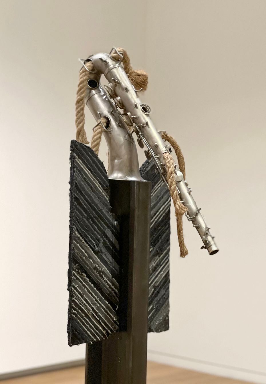 Jamal Cyrus' "Horn Beam Effigy" is a totemic construction topped by an inverted saxophone,...