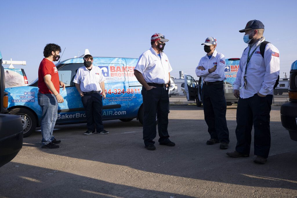 Plumbers wait to start the day on Sept. 1 at Baker Brothers Plumbing, Air & Electric in Mesquite.