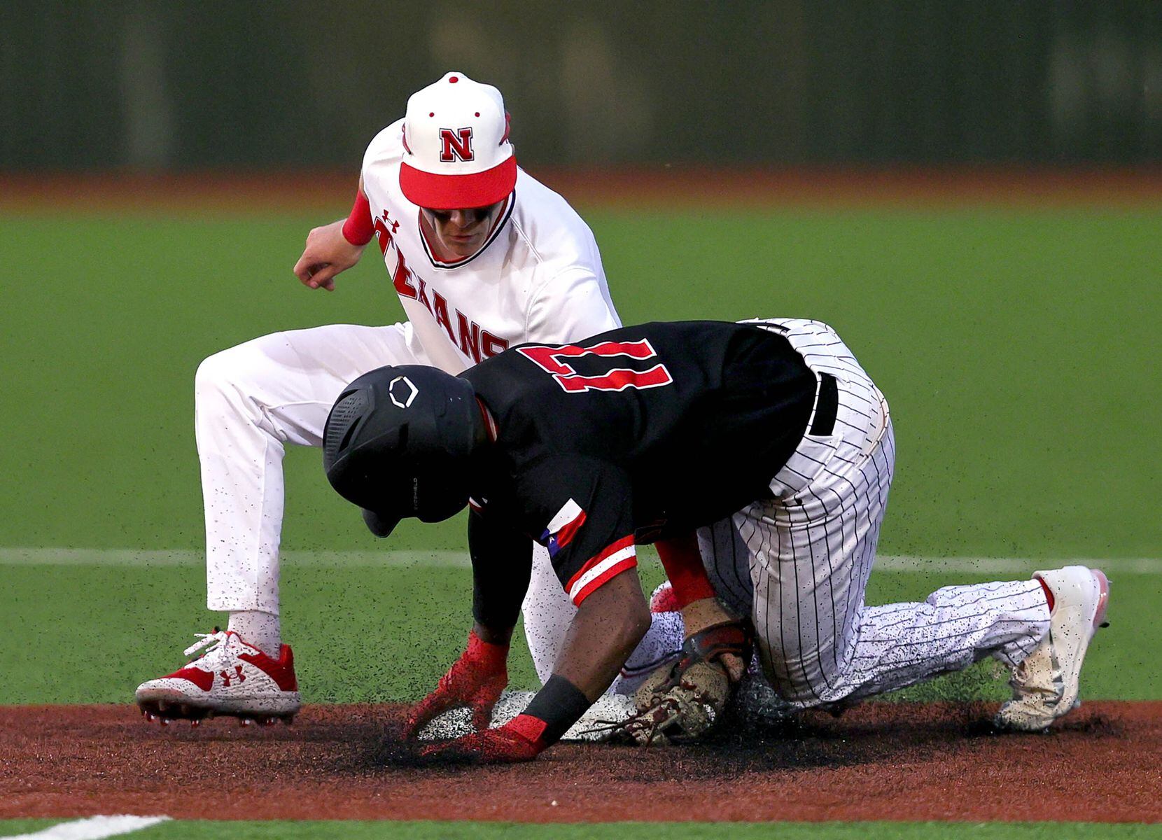 Mansfield Legacy right fielder Connor Crayton (17) gets tagged out at second base by Justin...