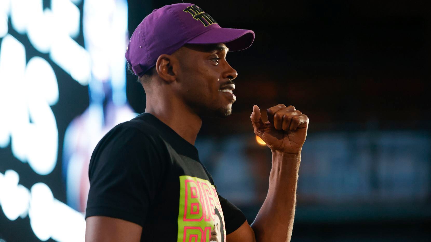 Errol Spence pumps his fist towards the crowd at the Texas Live! Media Workout, Wednesday,...