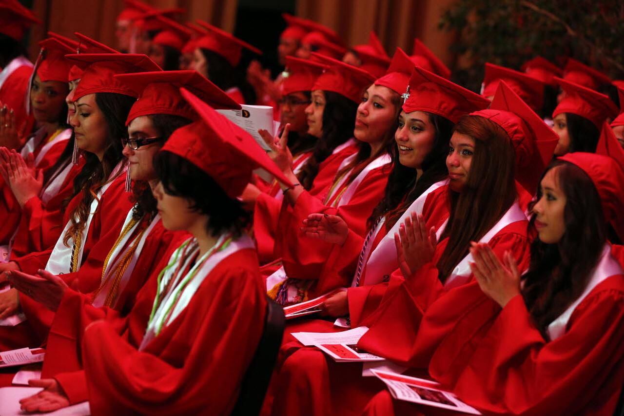 
The 2013 graduating class of Irma Lerma Rangel Young Women's Leadership School applauds the...