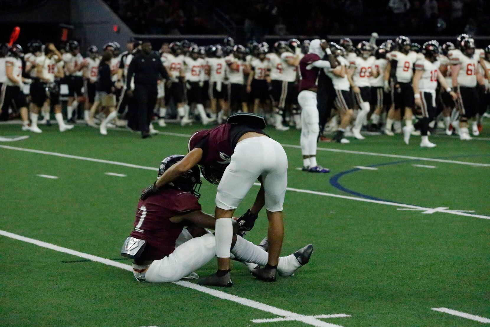 Mansfield Timberview High School’s Brandon Peteet-Moore (2) is comforted by Mansfield Timberview High School free safety Mohammad Rabie (36) after being defeated by Lovejoy High School in a Class 5A Division II Region II semifinal football game at The Ford Center in Frisco on Friday night, November 21, 2021. (Stewart F. House/Special Contributor)