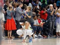 Dallas Wings forward Kayla Thornton (6) reacts after they defeated the New York Liberty...