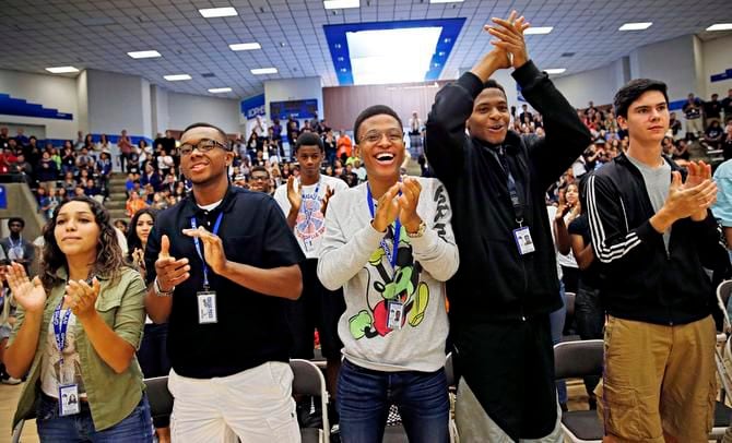 From left: Grand Prairie High School students Victoria-Lee Fitchett, Cameron Haley-Calcote,...