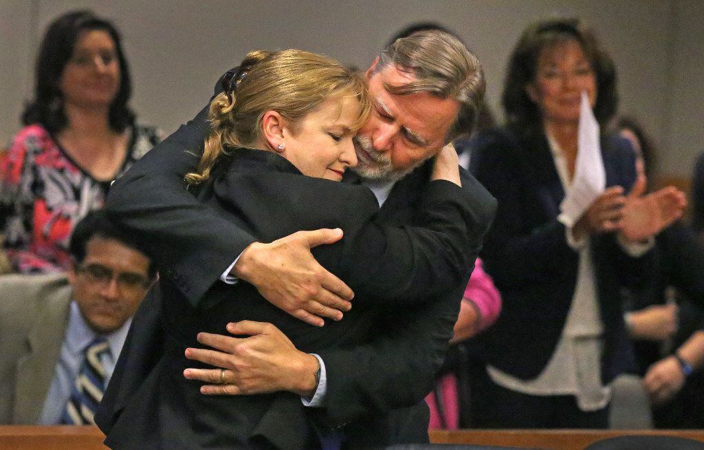 Former Judge Suzanne Wooten embraced her husband Wes Wayland after her 2011 convictions were...