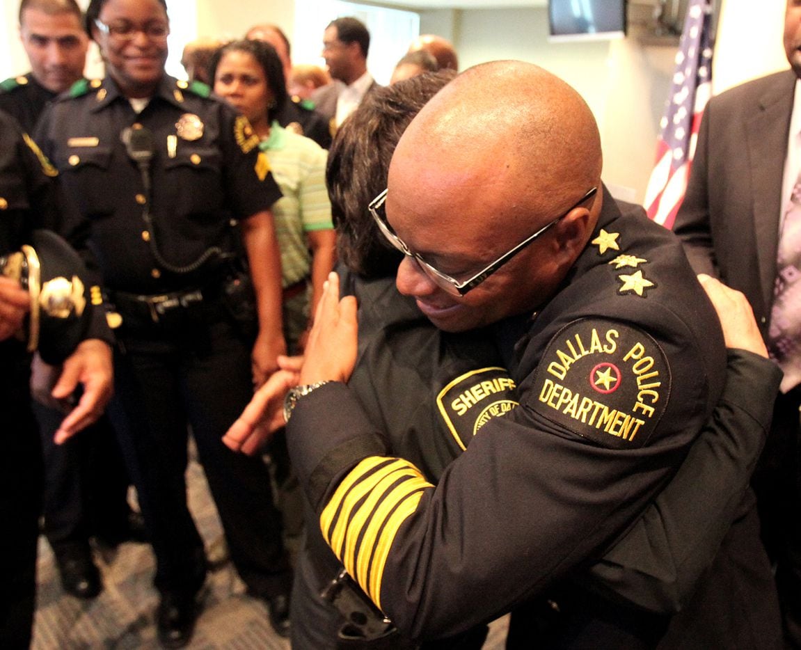 David Brown and Dallas County Sheriff Lupe Valdez embraced April 4, 2010 at Dallas Police...