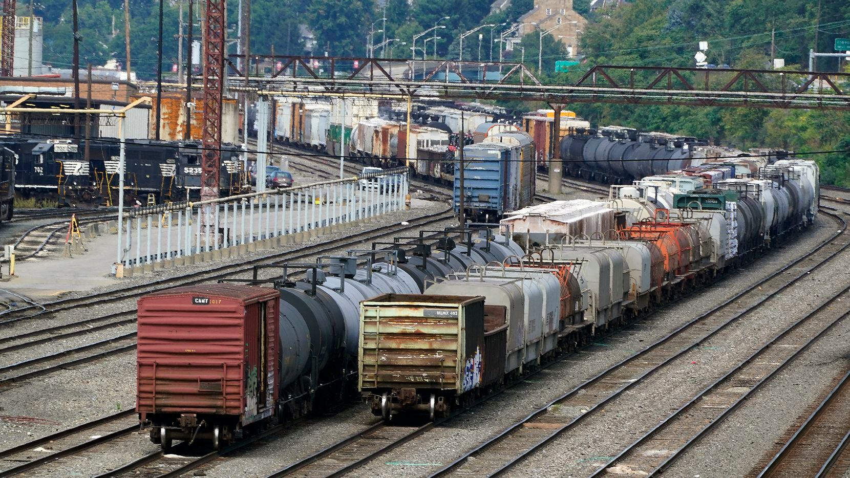 Freight cars wait to be hauled out of a Norfolk Southern terminal in Conway, Pa.