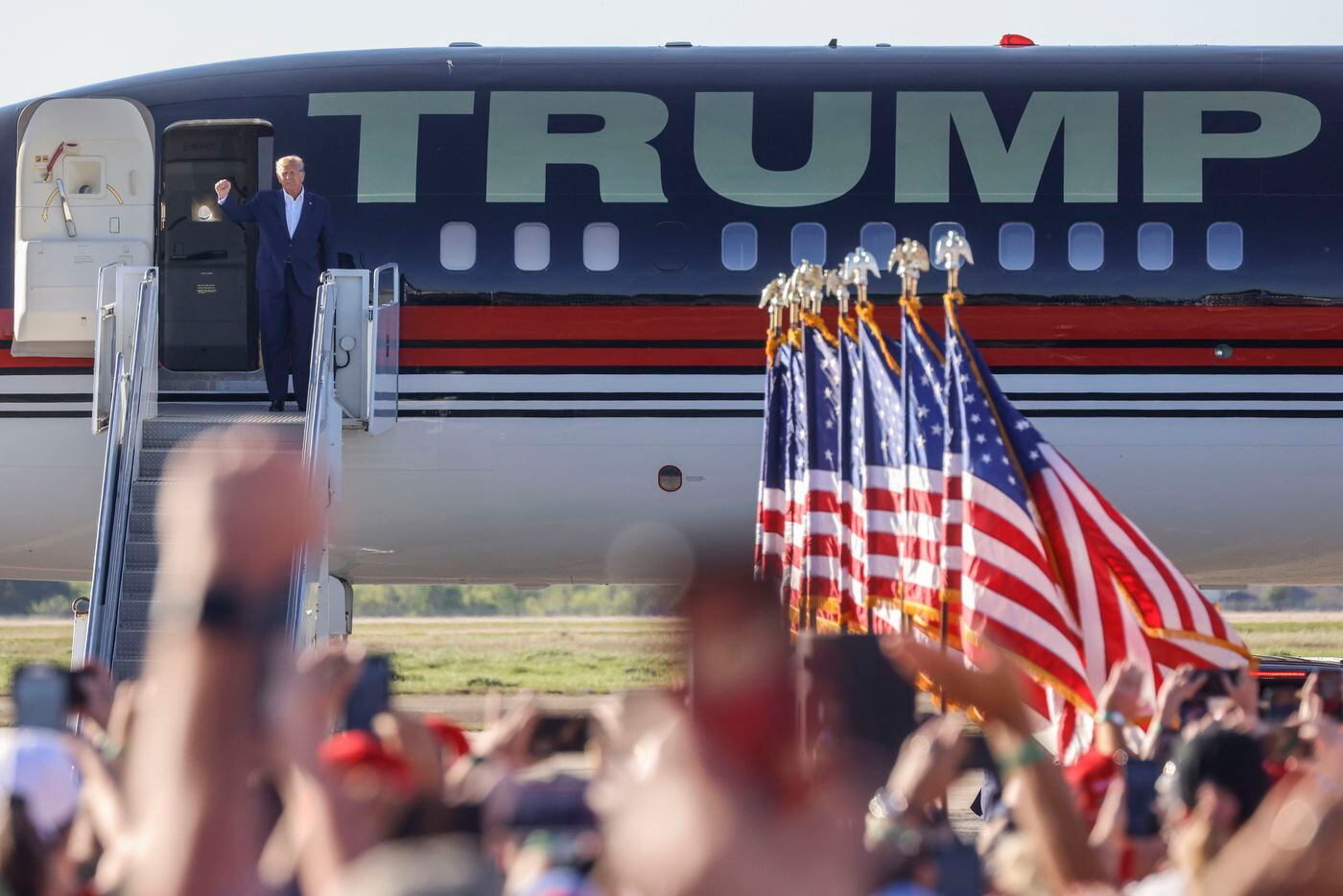 Former President Donald Trump arrives to speak at his first 2024 campaign rally on Saturday,...