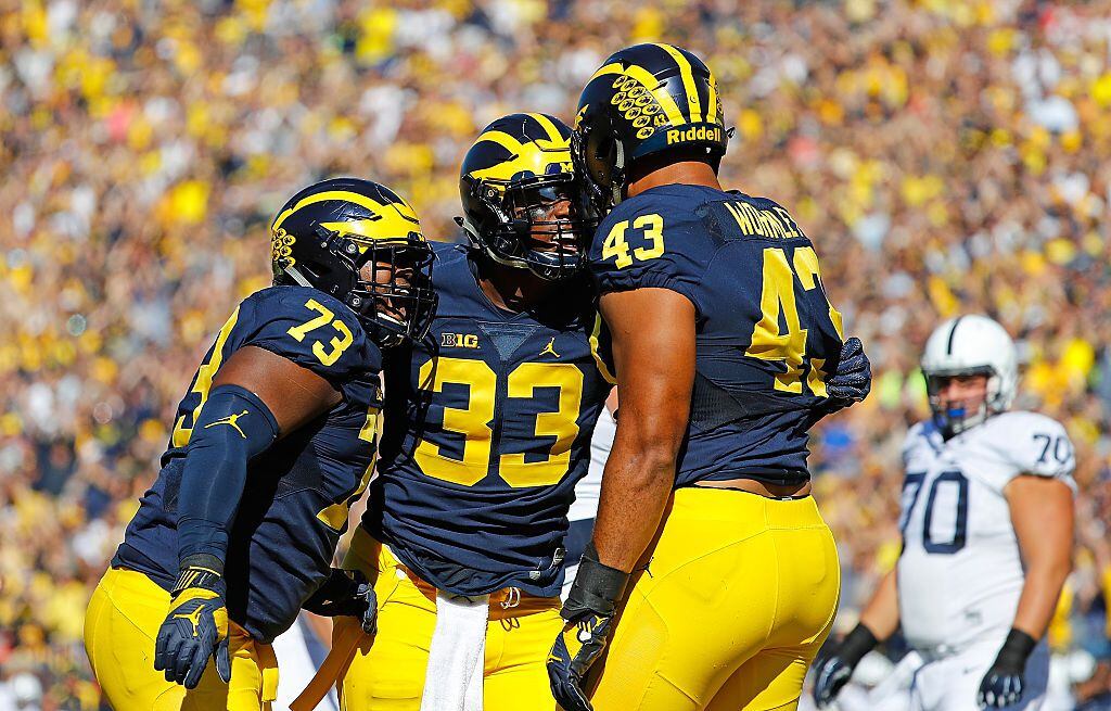 ANN ARBOR, MI - SEPTEMBER 24: Chris Wormley #43 of the Michigan Wolverines celebrates after...