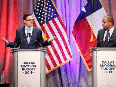 Dallas City Council member Scott Griggs (left) makes a point during his debate with State...